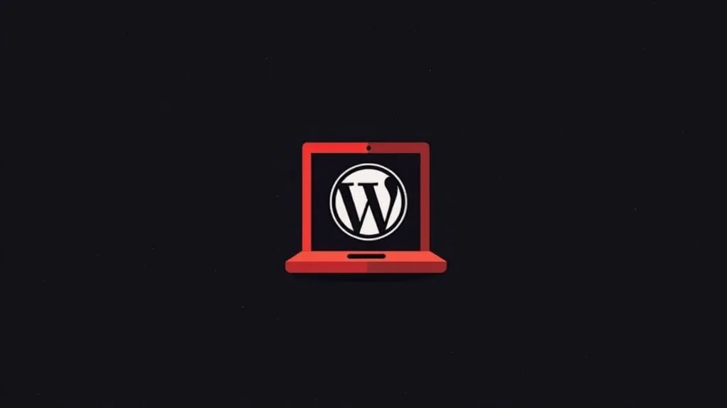 WordPress logo na crvenom laptopu - prikaz platforme za pravljenje veb sajtova